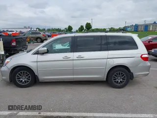 2007 Honda Odyssey Touring z VIN 5FNRL38877B091046, wystawiony jako IAAI lot #42187965 z przebiegiem Nie podano mil oraz . Historia ofert i sprzedaży dostępna na DreamBid. Obrazek 14.