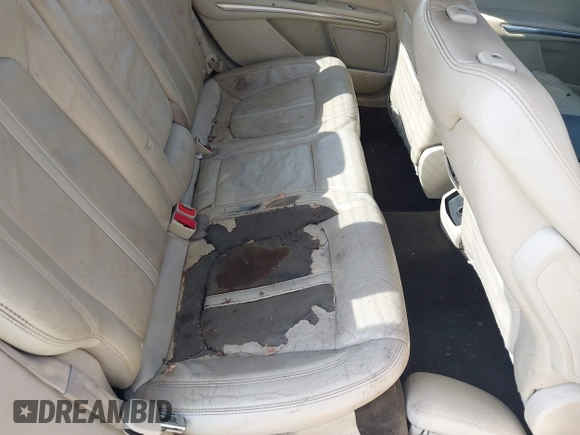 2014 Lincoln MKZ z VIN 3LN6L2G91ER821841, wystawiony jako IAAI lot #42655383 z przebiegiem Nie podano mil oraz . Historia ofert i sprzedaży dostępna na DreamBid. Obrazek 8.