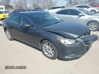 2016 Mazda 6 i Sport with VIN JM1GJ1U56G1473526, listed as a IAAI auction lot 41977842 with 85,542 mi miles and . Bid and sale history available at DreamBid. Image 1.