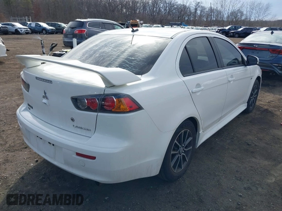 2015 Mitsubishi Lancer SE with VIN JA32V2FW9FU025402, listed as a IAAI auction lot 41646407 with 67,201 mi miles. Bid and sale history available at carsss.com. Image 4.