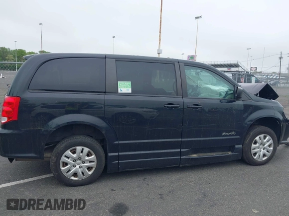 2018 Dodge Grand Caravan SE with VIN 2C7WDGBG5JR190468, listed as a IAAI auction lot 42173227 with 49,451 mi miles and . Bid and sale history available at DreamBid. Image 13.