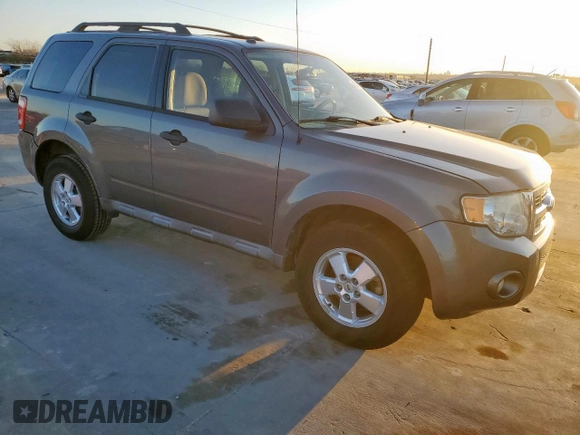 2011 Ford Escape XLT with VIN 1FMCU0D75BKC22917, listed as a Copart auction lot 48531065 with 198,854 mi miles and Salvage Title. Bid and sale history available at carsss.com. Image 4.