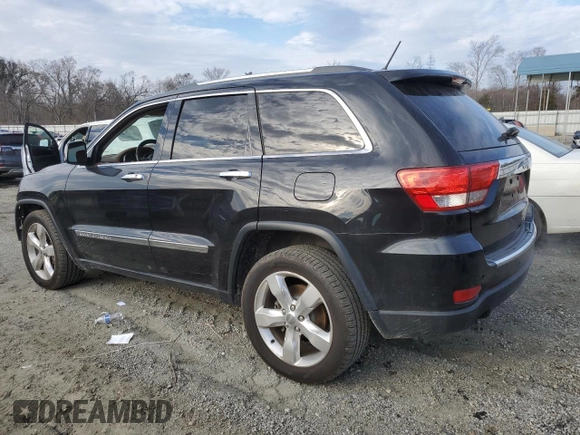 2013 Jeep Grand Cherokee Overland with VIN 1C4RJECT6DC655355, listed as a Copart auction lot 85654554 with 135,343 mi miles and Salvage Title. Bid and sale history available at carsss.com. Image 2.