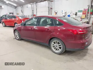 2015 Ford Focus SE with VIN 1FADP3F21FL270827, listed as a IAAI auction lot 42665015 with 162,745 mi miles and . Bid and sale history available at DreamBid. Image 3.