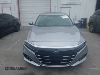 2021 Honda Accord Touring with VIN 1HGCV3F99MA020450, listed as a IAAI auction lot 42194371 with 19,206 mi miles and . Bid and sale history available at DreamBid. Image 12.