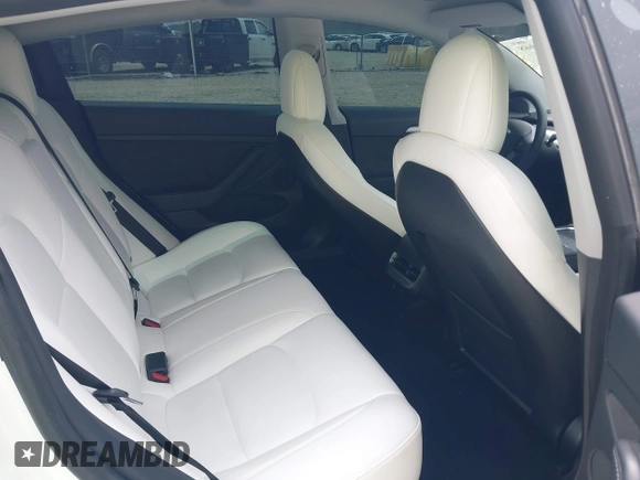 2021 Tesla Model 3 Long Range z VIN 5YJ3E1EB1MF975824, wystawiony jako IAAI lot #42146968 z przebiegiem 97 570 mil mil oraz . Historia ofert i sprzedaży dostępna na DreamBid. Obrazek 8.