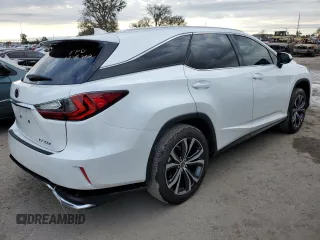 2022 Lexus RX with VIN JTJHZKEA5N2027824, listed as a Copart auction lot 71738562 with 5,100 mi miles. Bid and sale history available at carsss.com. Image 3.
