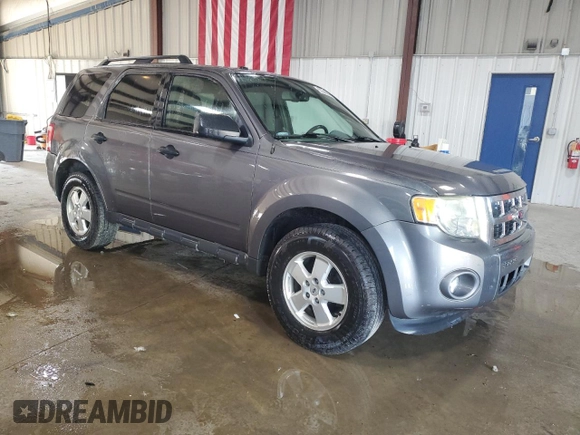 2012 Ford Escape XLT z VIN 1FMCU9DG8CKA93402, wystawiony jako Copart lot #62266845 z przebiegiem 196 779 mil mil oraz Szkoda całkowita • Salvage title. Historia ofert i sprzedaży dostępna na DreamBid. Obrazek 4.