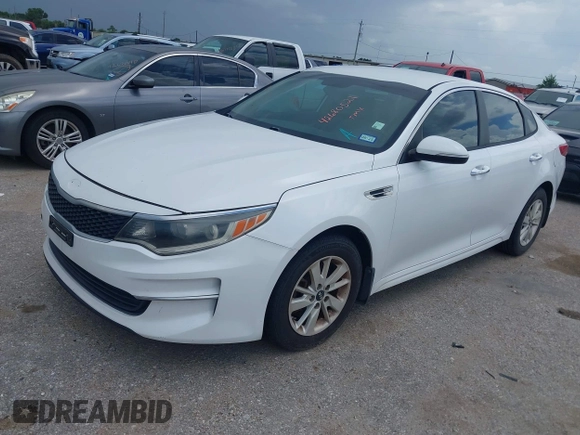 2018 Kia Optima S with VIN 5XXGT4L32JG184893, listed as a IAAI auction lot 42680521 with 55,225 mi miles and . Bid and sale history available at DreamBid. Image 2.