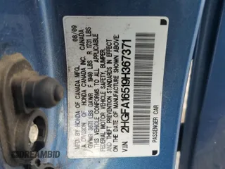 2009 Honda Civic LX z VIN 2HGFA16519H367371, wystawiony jako Copart lot #53455605 z przebiegiem 183 923 mil mil oraz Szkody całkowita. Historia ofert i sprzedaży dostępna na DreamBid. Obrazek 12.
