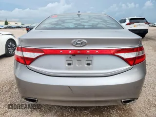 2013 Hyundai Azera z VIN KMHFG4JG9DA217664, wystawiony jako Copart lot #60855945 z przebiegiem 115 623 mil mil oraz Czysty tytuł • Clean title. Historia ofert i sprzedaży dostępna na DreamBid. Obrazek 6.