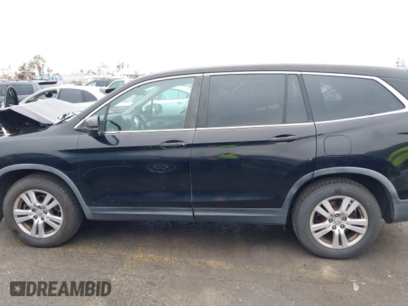 2016 Honda Pilot LX with VIN 5FNYF6H18GB063909, listed as a IAAI auction lot 41778361 with 110,655 mi miles. Bid and sale history available at carsss.com. Image 14.