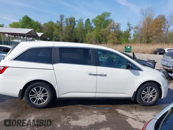 2011 Honda Odyssey EX-L with VIN 5FNRL5H6XBB059162, listed as a IAAI auction lot 42061378 with 164,317 mi miles and . Bid and sale history available at carsss.com. Image 13.