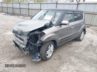 2011 Kia Soul + with VIN KNDJT2A24B7196798, listed as a IAAI auction lot 42016389 with 153,829 mi miles. Bid and sale history available at carsss.com. Image 2.