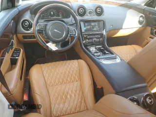 2016 Jaguar XJ Portfolio with VIN SAJWJ2GDXG8W03143, listed as a Copart auction lot 86467114 with 42,923 mi miles and Salvage title. Bid and sale history available at DreamBid. Image 8.