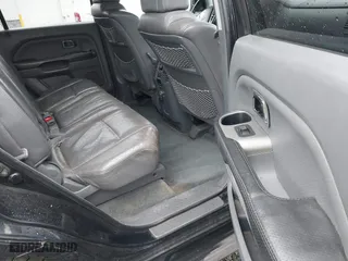 2004 Honda Pilot EX with VIN 2HKYF18674H585328, listed as a IAAI auction lot 41688735 with 214,194 mi miles. Bid and sale history available at carsss.com. Image 8.