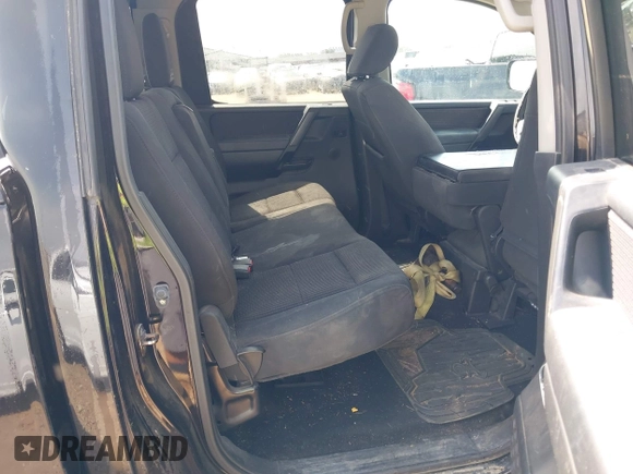 2012 Nissan Titan SV with VIN 1N6AA0EK2CN306066, listed as a IAAI auction lot 42106379 with 135,556 mi miles and . Bid and sale history available at DreamBid. Image 8.