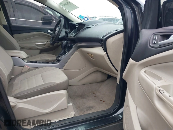 2013 Ford Escape SE with VIN 1FMCU0GX5DUB68604, listed as a IAAI auction lot 42126594 with 165,540 mi miles and . Bid and sale history available at carsss.com. Image 5.