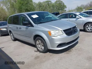 2012 Ram Cargo Van with VIN 2C4RDGAGXCR243180, listed as a IAAI auction lot 42061918 with 204,251 mi miles. Bid and sale history available at carsss.com. Image 1.