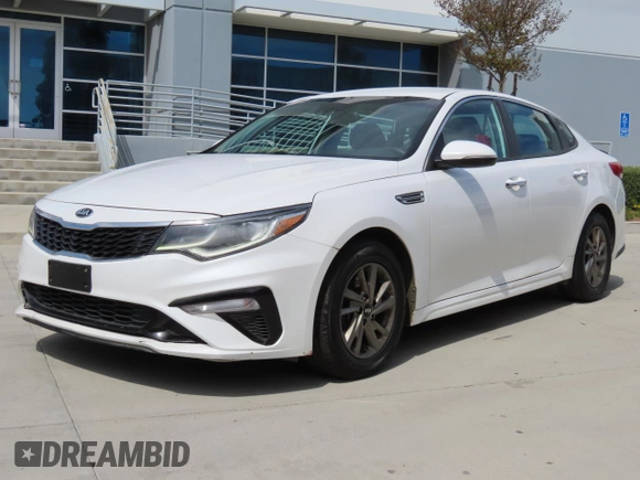 2019 Kia Optima LX with VIN 5XXGT4L36KG329998, listed as a Copart auction lot 52011715 with 123,942 mi miles and Salvage Title. Bid and sale history available at DreamBid. Image 2.