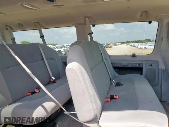 2009 Ford Econoline Passenger XL with VIN 1FBNE31L39DA56400, listed as a Copart auction lot 59878595 with 249,112 mi miles and Salvage title. Bid and sale history available at DreamBid. Image 11.