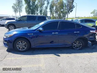 2019 Kia Optima LX with VIN 5XXGT4L31KG345560, listed as a IAAI auction lot 42002764 with 108,470 mi miles. Bid and sale history available at carsss.com. Image 14.
