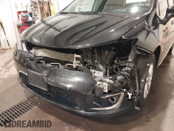2020 Chrysler Pacifica Touring L with VIN 2C4RC1BG9LR140072, listed as a IAAI auction lot 42199118 with 93,557 mi miles and . Bid and sale history available at DreamBid. Image 6.