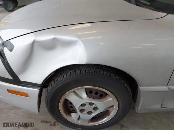 2004 Pontiac Sunfire with VIN 1G2JB12F547212948, listed as a IAAI auction lot 41721453 with 268,430 mi miles. Bid and sale history available at carsss.com. Image 6.
