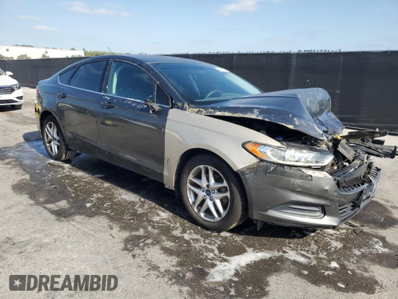 2015 Ford Fusion SE z VIN 3FA6P0HDXFR108055, wystawiony jako Copart lot #54801165 z przebiegiem 99 728 mil mil oraz Szkoda całkowita • Salvage title. Historia ofert i sprzedaży dostępna na DreamBid. Obrazek 4.