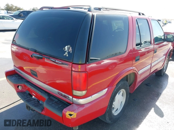 1998 GMC Jimmy SL z VIN 1GKCS13W2W2535684, wystawiony jako IAAI lot #41789456 z przebiegiem 211 201 mil mil oraz . Historia ofert i sprzedaży dostępna na DreamBid. Obrazek 12.
