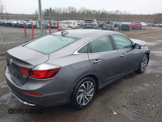 2020 Honda Insight Touring with VIN 19XZE4F98LE011149, listed as a IAAI auction lot 41834043 with 54,251 mi miles and . Bid and sale history available at carsss.com. Image 4.