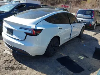 2025 Tesla Model 3 Long Range with VIN 5YJ3E1EB4SF914979, listed as a IAAI auction lot 41695023 with 2,263 mi miles and . Bid and sale history available at DreamBid. Image 4.