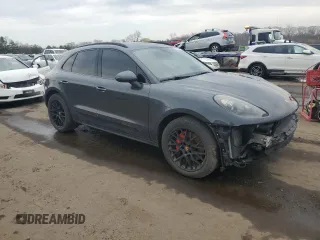 2017 Porsche Macan GTS with VIN WP1AG2A55HLB50104, listed as a Copart auction lot 52354985 with 111,447 mi miles and Salvage title. Bid and sale history available at DreamBid. Image 4.