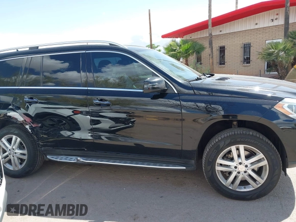 2014 Mercedes-Benz GL 450 z VIN 4JGDF7CE1EA342408, wystawiony jako IAAI lot #41968441 z przebiegiem 120 459 mil mil oraz . Historia ofert i sprzedaży dostępna na DreamBid. Obrazek 13.