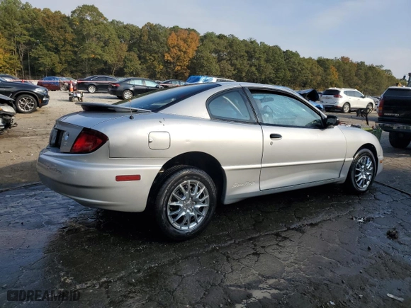 2004 Pontiac Sunfire with VIN 1G2JB12F247165264, listed as a Copart auction lot 77872304 with 128,428 mi miles and Salvage Title. Bid and sale history available at carsss.com. Image 3.