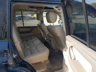 2004 Toyota Land Cruiser with VIN JTEHT05J942054673, listed as a IAAI auction lot 42112791 with 206,784 mi miles. Bid and sale history available at carsss.com. Image 8.