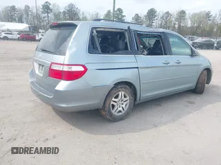 2007 Honda Odyssey EX-L z VIN 5FNRL38757B046761, wystawiony jako IAAI lot #41943033 z przebiegiem 309 270 mil mil oraz . Historia ofert i sprzedaży dostępna na DreamBid. Obrazek 4.