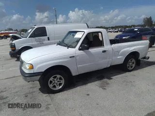 1999 Mazda B-Series 2WD Truck SX with VIN 4F4YR12C2XTM44471, listed as a IAAI auction lot 39659921 with 274,006 mi miles. Bid and sale history available at carsss.com. Image 2.
