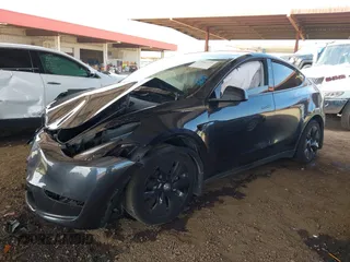 2024 Tesla Model Y with VIN 7SAYGDED9RF053203, listed as a IAAI auction lot 41906729 with Not Provided miles and . Bid and sale history available at DreamBid. Image 2.