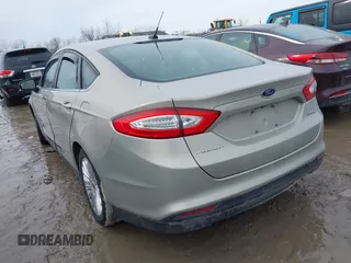 2015 Ford Fusion S Hybrid with VIN 3FA6P0UU4FR111409, listed as a IAAI auction lot 41447316 with 150,068 mi miles. Bid and sale history available at carsss.com. Image 3.