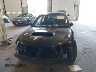2014 Subaru WRX WRX Premium with VIN JF1GV7F63EG005928, listed as a IAAI auction lot 42140987 with 89,730 mi miles and . Bid and sale history available at DreamBid. Image 13.