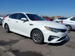 2019 Kia Optima LX z VIN 5XXGT4L34KG364135, wystawiony jako IAAI lot #42290656 z przebiegiem 50 533 mil mil oraz . Historia ofert i sprzedaży dostępna na DreamBid. Obrazek 1.