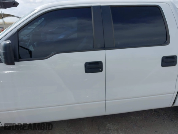 2014 Ford F-150 XL with VIN 1FTEW1CMXEKD40762, listed as a IAAI auction lot 42400704 with 75,769 mi miles and . Bid and sale history available at DreamBid. Image 14.