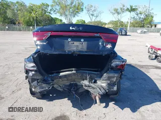 2023 Kia Forte LXS z VIN 3KPF24AD5PE554908, wystawiony jako IAAI lot #41781608 z przebiegiem 84 666 mil mil oraz . Historia ofert i sprzedaży dostępna na DreamBid. Obrazek 17.