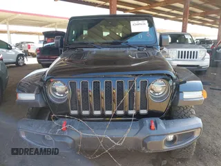 2019 Jeep Wrangler Unlimited Rubicon with VIN 1C4HJXFN5KW522991, listed as a IAAI auction lot 42609616 with 111,844 mi miles and . Bid and sale history available at DreamBid. Image 13.