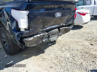 2024 Ford F-150 Lightning Flash with VIN 1FT6W3L75RWG30755, listed as a IAAI auction lot 41817158 with 1,932 mi miles and . Bid and sale history available at DreamBid. Image 6.