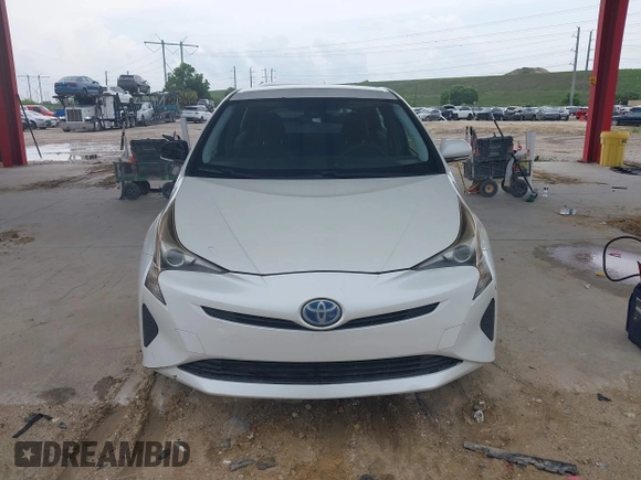 2017 Toyota Prius Two with VIN JTDKBRFU2H3035537, listed as a IAAI auction lot 42408704 with 179,112 mi miles and . Bid and sale history available at DreamBid. Image 12.