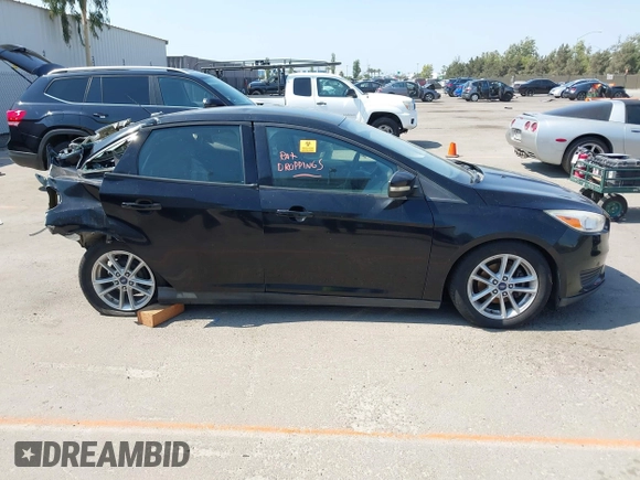 2016 Ford Focus SE z VIN 1FADP3F28GL213252, wystawiony jako IAAI lot #42660857 z przebiegiem 120 226 mil mil oraz . Historia ofert i sprzedaży dostępna na DreamBid. Obrazek 12.