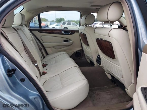 2005 Jaguar XJ VDP with VIN SAJWA82C45SG36059, listed as a Copart auction lot 69289734 with NaN miles and Salvage Title. Bid and sale history available at carsss.com. Image 10.