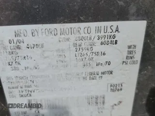 2004 Ford F-250 XL with VIN 1FTNW20P44EC09571, listed as a Copart auction lot 52986575 with Not provided miles and Salvage title. Bid and sale history available at DreamBid. Image 12.